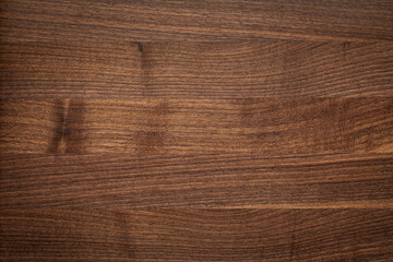 Wood texture background. Black walnut wood texture background. Walnut wood planks texture.	