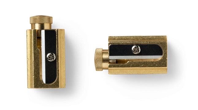 closeup of a golden brass pencil sharpener in two different positions, isolated business, art, or school design element