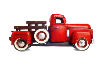 Vintage metal truck close-up on a white background. Red toy truck isolated on white background.