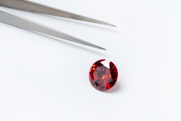 Red Ruby gemstone Round Cut isolate on white background, close up shot