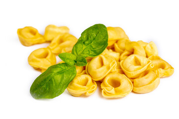 Fototapeta na wymiar Raw fresh tortellini pasta isolated on white background