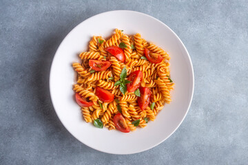 Fusilli pasta, spiral or spirali pasta with tomato sauce - Italian food style