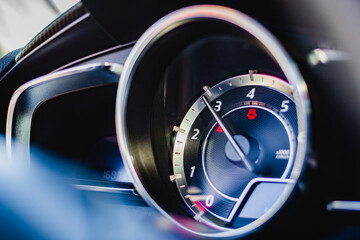 close up of a car speedometer