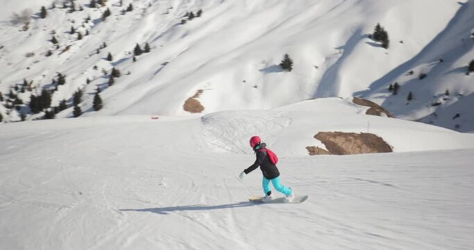 Snowboarder follow shot