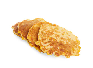 Many tasty corn pancakes on white background