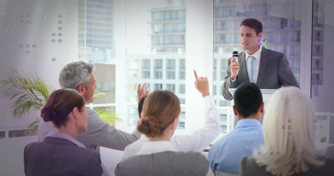 Animation of abstract shapes over caucasian businessman asking question at business conference