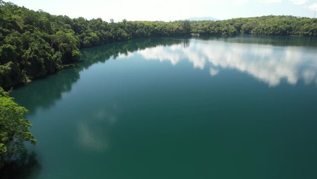 Spectacular aerial footage of Lake Eacham Atherton Tablelands Queensland Australia
