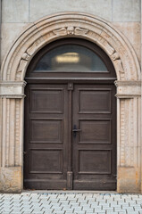 View of old building with wooden door