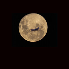Air Force plane against full moon