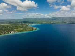 Cebu island with mountains view from the sea. Seascape in the tropics. Philippines.