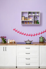 Interior of modern kitchen decorated for Easter celebration