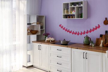 Interior of modern kitchen decorated for Easter celebration
