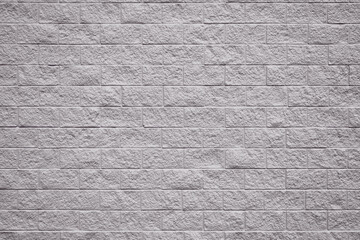 Large gray stone brick wall grunge background