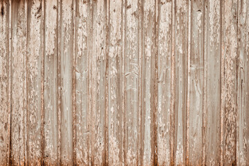 Brown weathered textured wood board and batten background