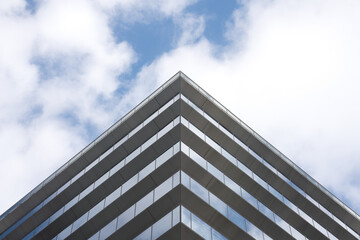 Fototapeta na wymiar modern geometric office building with sky