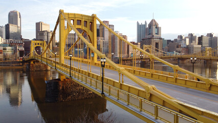 Yellow steel bridge over river - obrazy, fototapety, plakaty