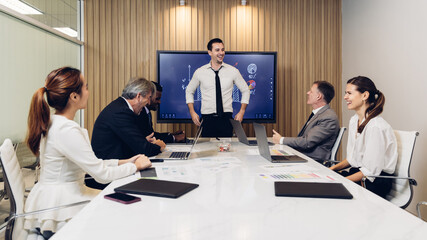 Diverse colleagues gather in brainstorm discuss statistics together. Group of people colleagues gather doing Brainstorming business plan together. Team Brainstorm Working Concept.	