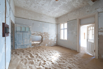 Kolmanskop, The abandoned houses. the famous tourist attraction in Namibia, South Africa. Empty sand dune in home room . The ghost town.