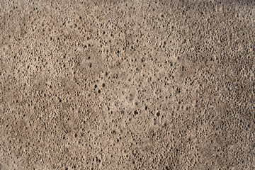 The texture of the cement and concrete wall is similar to the lunar surface. Texture for pattern or background