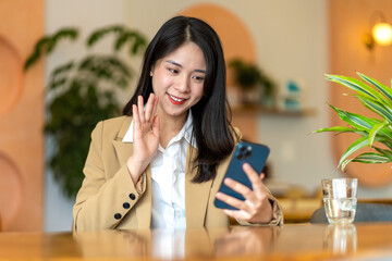 Asian businesswoman working in a cafe