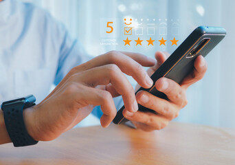Customer service evaluation concept.Business people or customers show satisfaction.satisfaction rating and 5 stars.