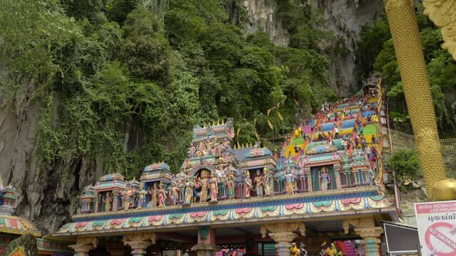 Colorful stairs crowded of pilgrims during Thaipusam at Batu Caves Kuala Lumpur Malaysia