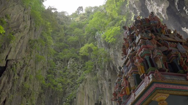 Architectural view top of Sri Velayuthar Temple Thaipusam at Batu Caves Kuala Lumpur Malaysia tilt shot