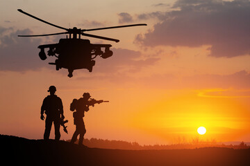 Plakat Silhouettes of helicopter and soldiers on background of sunset. Greeting card for Veterans Day, Memorial Day, Air Force Day. USA celebration.