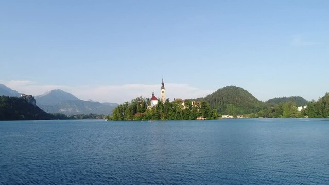 Lake Bled Island Church, Aerial Drone Above Blue Water, People Paddling, Julian Alps, European Travel and Tourism Summer Destination