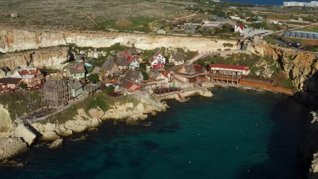 Timber Architectures At Popeye Village In The Island Of Malta, Mellieħa, Malta. Aerial Drone Shot