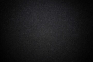 Black dark background with light copyspace in middle. Toned grunge retro vintage wallpaper with cardboard texture surface. Mockup design for dark arts. Blackout Tuesday concept. protest.