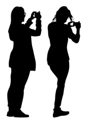 Woman with a photo camera on white background