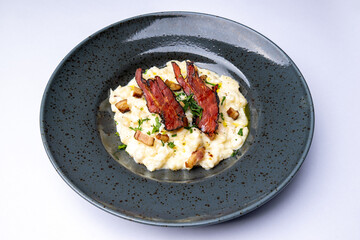 Slovak bryndza gnocchi topped with roasted bacon