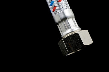 close-up spare parts for plumbing repair isolated on black background
