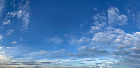 Natural seasonal blue color sky with white clouds, pure tranguil horizontal outdoors landscape....