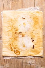 Baking papers with the stains left by the different foods cooked with them.