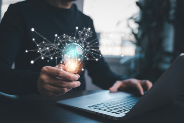 thinking and creative concept, Close up the light bulb and man working on the desk, Creativity, and innovation are keys to success,  new idea and innovation with Brain and light bulbs,big data