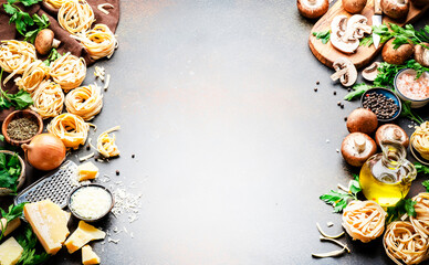 Fototapeta na wymiar Food background. Uncooked pasta, brown mushrooms, vegetables, cheese and ingredients for tasty cooking on brown table background, top view. Copy space