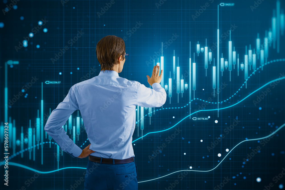 Poster trading, investing and stock market analytics concept with businessman back view touching virtual wa