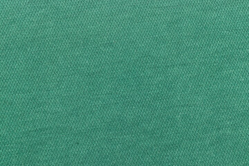close up photo of green fabric texture background - Powered by Adobe