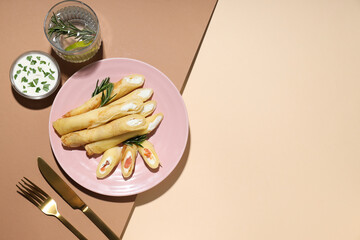 Concept of tasty food, thin pancakes with filling, space for text