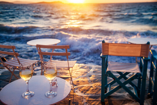 romantic evening on the beach with two glasses of wine