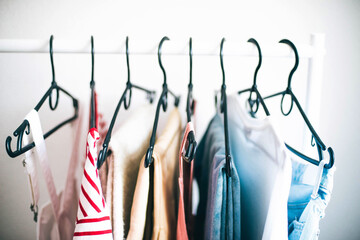 Close up of  clothing on a  rack.