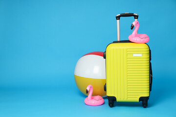 Suitcase, luggage, baggage for summer travel and vacation, space for text