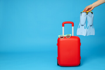 Suitcase, luggage, baggage for summer travel and vacation, space for text