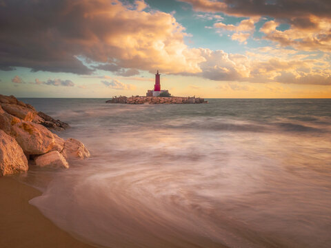 golden hour in a cloudy day over the lighthouse of Villajoyosa