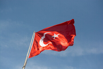 Turkish national flag hang on a pole in open air