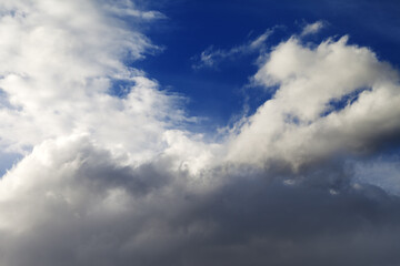 Naklejka na ściany i meble Blue sky with clouds at sun winter day