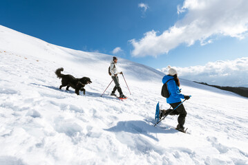 a trip on the snow with snowshoes