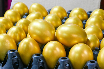 Golden egges in cart, cooking recipes. Different egges. Selective focus.